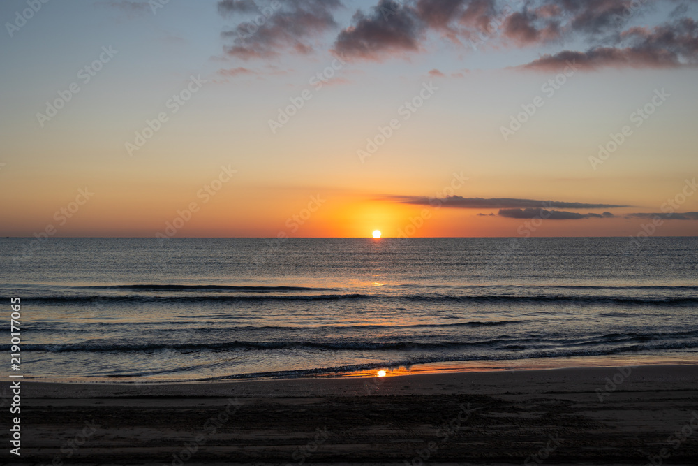Fototapeta premium Mediterranean Sunrise Over the Sea in Valencia, Spain
