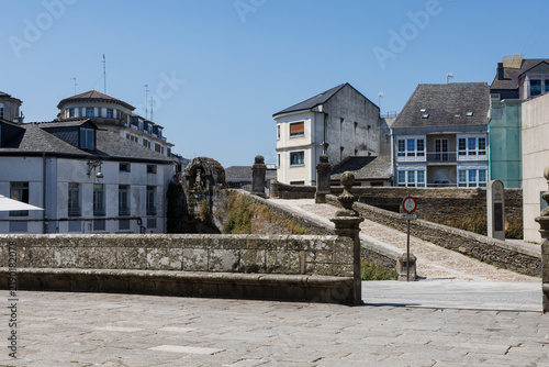 Bild auf Leinwand Ancient Roman Walls of Lugo with the Historic Porta de Santiago Gateway, Lugo, S