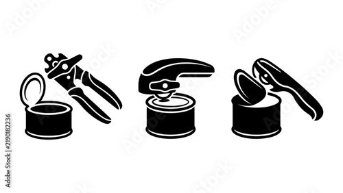 Foto Showing kitchen tools, including manual can opener tin can being opened, isolate