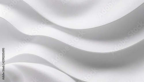 Abstract close-up view of smooth white fabric with flowing curves and shadows