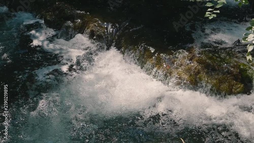 Rushing stream and foaming cascade.