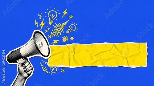 Hand holding a megaphone with a yellow paper banner for text on a blue background