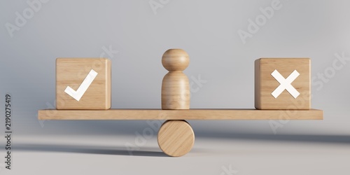 Wooden figure between boxes with checkmark and cross on wooden scale in balance over grey wall background, check or deny decision concept