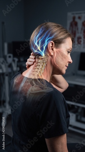 Woman holding her painful neck with x-ray anatomy showing cervical spine and glowing nerves