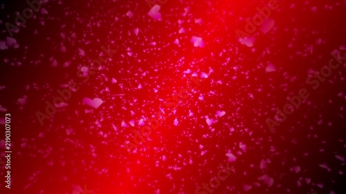 Pink heart shapes falling down or flying away on red background. Abstract background for Happy Valentine's day and wedding ceremony.