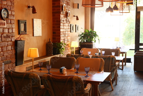 Lush plant filled cafe interior with sustainable design elements