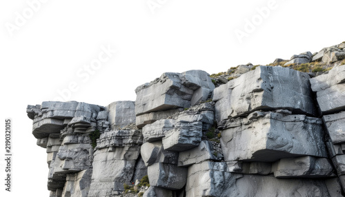 Natural Rocky Stone Formation with Layered Gray Cliff Surface and Rugged Geological Texture Isolated on transparent background
