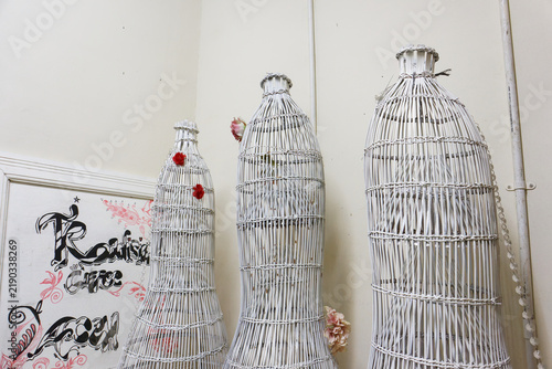 Obraz na płótnie Wicker Woven Ornaments Arranged Indoors for Rustic Cafe Interior