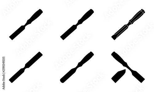 Bild auf Leinwand Collection of six black silhouettes of chisels on white background