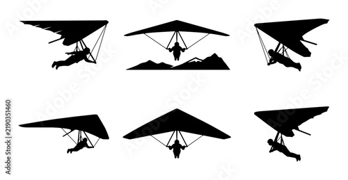 Принти на полотні Black hang glider silhouettes on white background, adventure sport