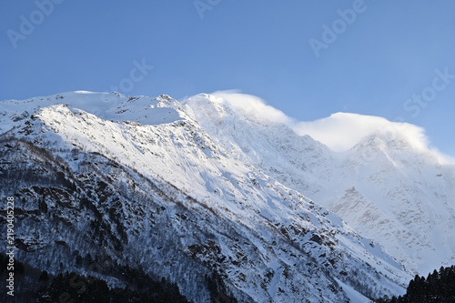 Mountain landscape with rocks and snow, Prielbrusye, Kabardino-Balkaria, Russia