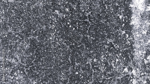 Fotografie Dark monochrome stone texture with fine grain, rough weathered surface, and subtle irregular patterns, creating a dramatic abstract background