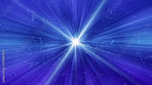 Blue glowing starburst with shining light rays and floating particles background loop