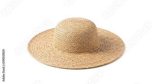 A stylish straw hat with a wide brim and natural texture on a white background