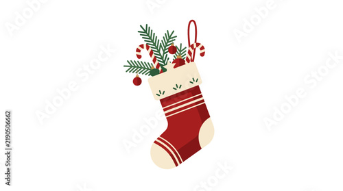 Decorative Red Christmas Stocking Filled With Festive Holiday Pine Branches and Candy Canes