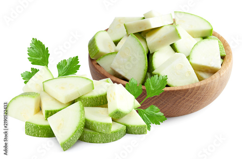 sliced fresh green zucchini or marrow isolated on white background. clipping path