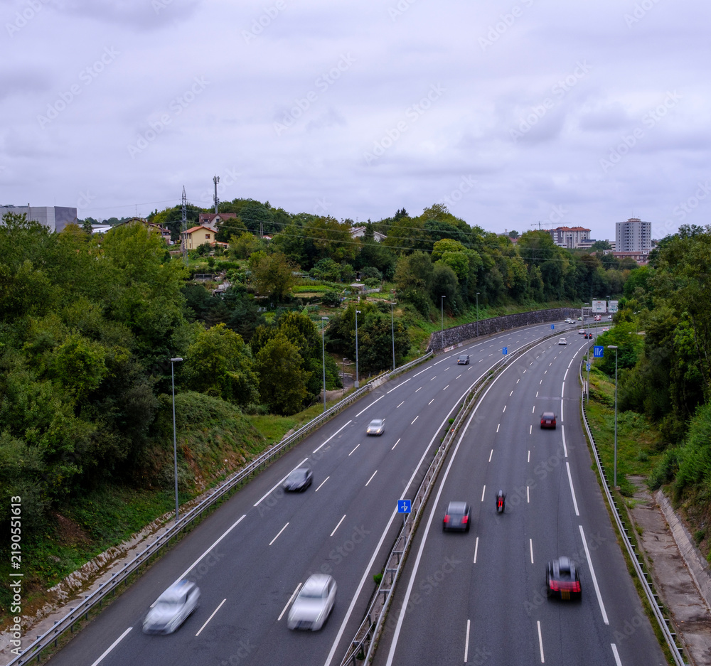 Obraz premium Cars in motion on the highway in Donostia-San Sebastian, Basque Country, Spain