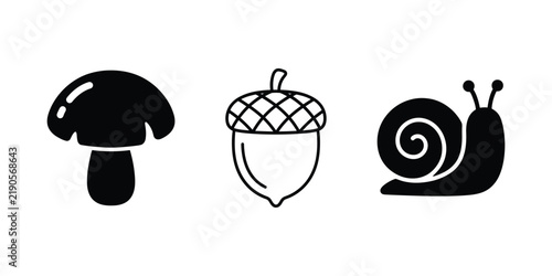 Forest nature vector icon set featuring wild edible mushroom silhouette, textured oak acorn, and crawling snail symbols.