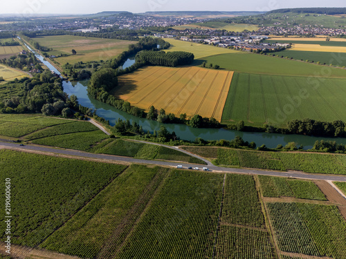 Aerial view, Cumieres and Hautvillers champagne vineyards in Marne Valley with rolling green hills, chalk terroir, summer landscape, traditional methode champenoise production.