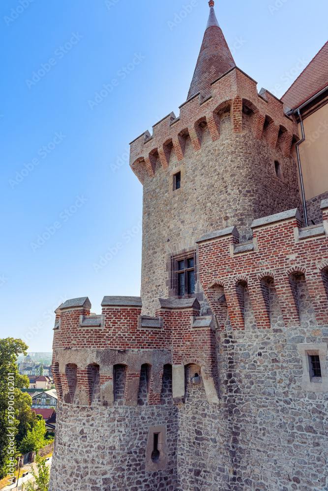 © josemiguelsangar - Close view of a fortified tower at Corvin Castle in Hunedoara Transylvania Romania