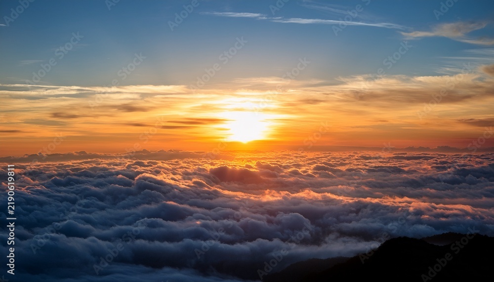 Obraz premium Sunset Over The Clouds