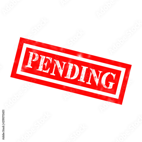 Foto A bright red rubber stamp with the word pending written in white letters inside