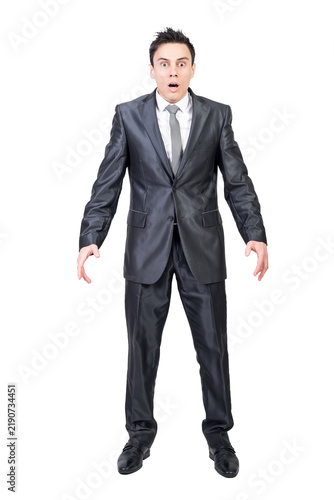 Obraz na plátně Full length of shocked young male manager in formal suit and tie with dark hair
