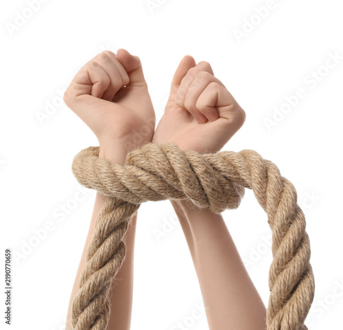 Bild auf Leinwand Human rights abuse and captivity hands tied with thick rope oppression helplessn