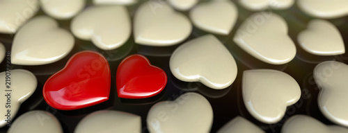 Obraz na plátne Red and white hearts on a dark background