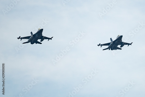 F16 fighter jets isolated against a blue sky