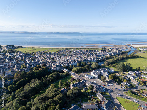 High wide aerial view of Nairn town center, River Nairn, Nairn Beach, and Moray Firth in Nairnshire, Scottish Highlands, Scotland