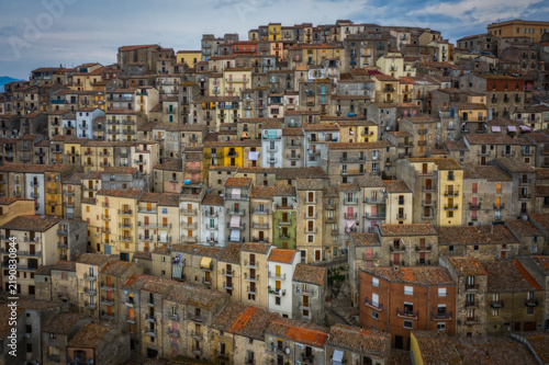 Sunrise view of the rooftops of Gangi with morning fog. Sicily, Italy. August 2024. Aerial drone picture.