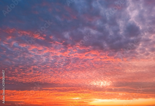 Vibrant Sunset Sky with Colorful Clouds in Shades of Orange and Purple