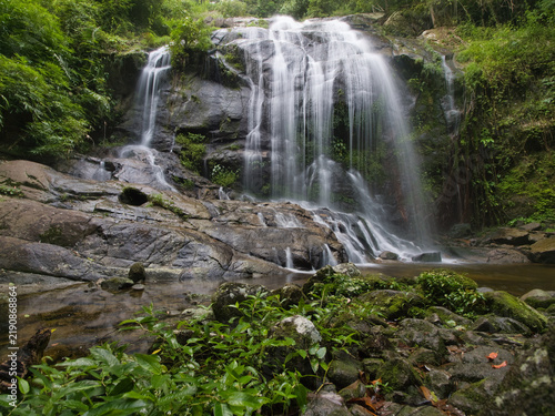 Quadro su tela Nan nam fung the 16th tier of dad fa waterfall nestled within the lush rainforest of tai rom yen national park in ban na san district surat thani province thailand