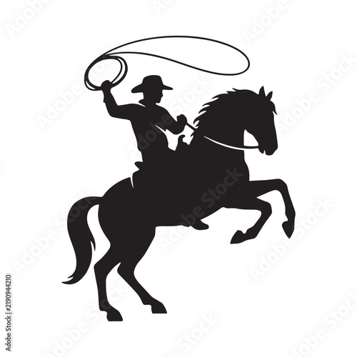 Cowboy riding horse with lasso is a black silhouette on white