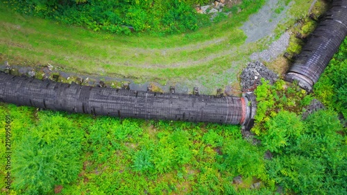 Summer aerial view featuring the 3.4 mile long wooden penstock in Vermont known as The Snake that runs from the Searsburg Dam to a generating station along the Deerfield River with an 8 foot diameter