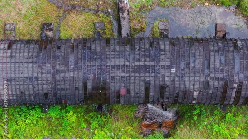 Summer aerial view featuring the 3.4 mile long wooden penstock in Vermont known as The Snake that runs from the Searsburg Dam to a generating station along the Deerfield River with an 8 foot diameter