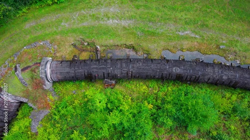 Summer aerial view featuring the 3.4 mile long wooden penstock in Vermont known as The Snake that runs from the Searsburg Dam to a generating station along the Deerfield River with an 8 foot diameter