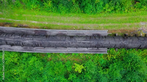 Summer aerial view featuring the 3.4 mile long wooden penstock in Vermont known as The Snake that runs from the Searsburg Dam to a generating station along the Deerfield River with an 8 foot diameter