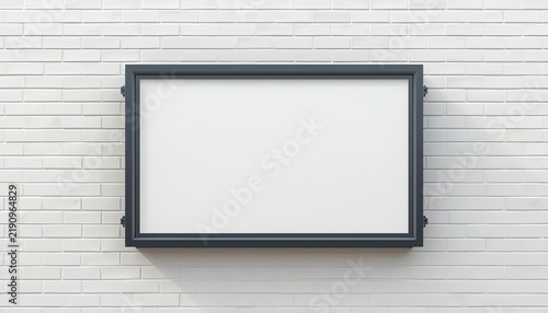 Glowing rectangular sign on brick wall