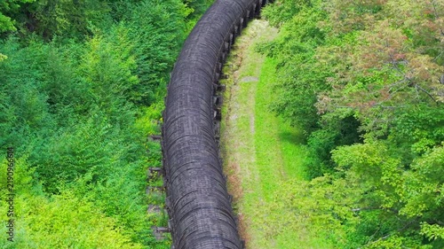Summer aerial view featuring the 3.4 mile long wooden penstock in Vermont known as The Snake that runs from the Searsburg Dam to a generating station along the Deerfield River with an 8 foot diameter