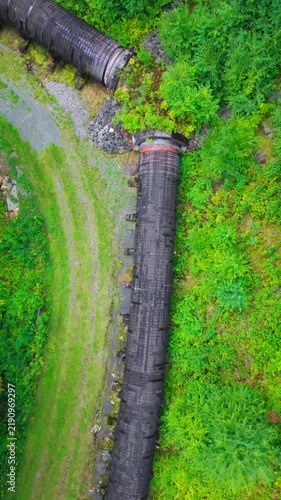 Summer aerial view featuring the 3.4 mile long wooden penstock in Vermont known as The Snake that runs from the Searsburg Dam to a generating station along the Deerfield River with an 8 foot diameter