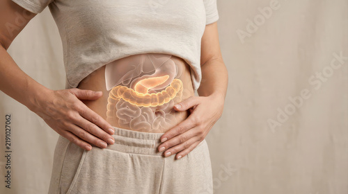 Woman holding abdomen with digestive organ illustration for obesity insulin resistance awareness and abdominal health concept