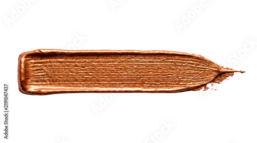 Single horizontal smear of metallic bronze acrylic paint.