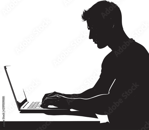 Silhouette of man sitting and working on a laptop computer