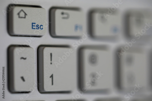 Bild auf Leinwand Close-Up of Computer Keyboard Featuring Escape Key with Soft Focus and Minimalis