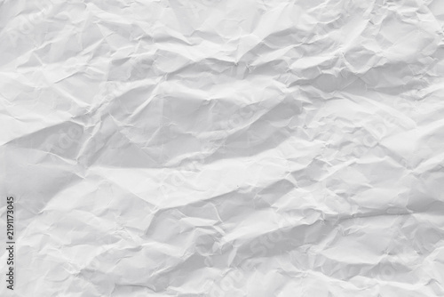 Texture crease of white paper for template wallpaper. wrinkle of gray paper crumpled background.