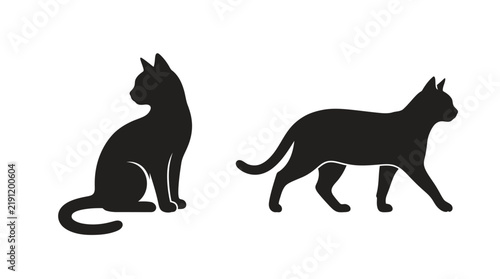 Canvas Print Two black cat silhouettes depict different poses on transparent background