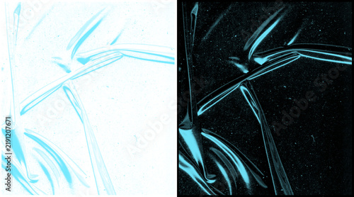 Konstfotografi Abstract cyan light trails on white and black background
