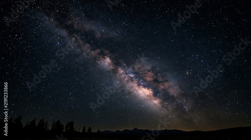 Milky way galaxy over dark night sky
